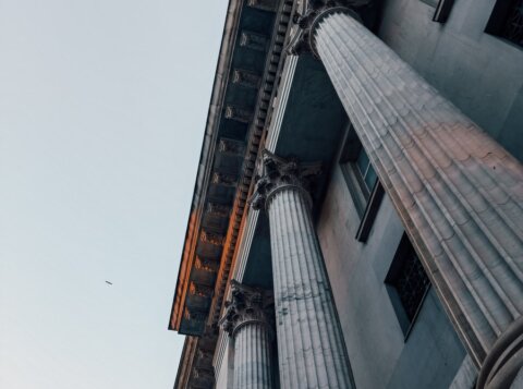 low angle photography of gray concrete building