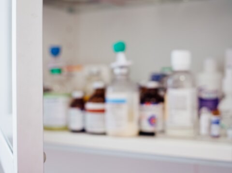 white and red labeled bottles