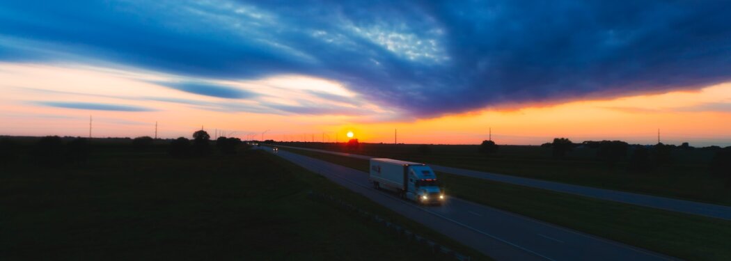 a sunset over a road